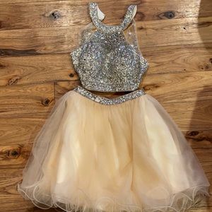 Gorgeous two piece peach colored dress.